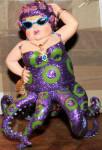 The original Miss Fran was a big ornament standing about 5 inches tall like  Margarita. They made this one smaller in the later years ending up with Miss Fran III which doesn't do the ornament justice. The bigger the better is the case with this and the Margarita ornaments. She is the only octopus, but she belongs with the mermaids.