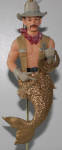 Clint the cowboy is another merman that is one of the best ones as far as I'm concerned. I saw him back when he hit the stores, and thought he was one of a kind. He carries a piece of rope for lassoing his boys. He looks just like one of the Village People. A keeper!