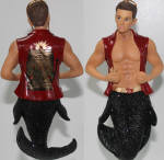 I really like this merman. I was not impressed by the initial pictures on him either, because of the design on his back wasn't shown by the company. He looks way better than any picture of him up close. A no brainer, GET this one!