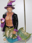 This merman is gorgeous in appearance. The colors are bright and beautiful. The crystal ball illuminates light when there is some surrounding the ornament. I am listing him here and in my Halloween section, because he deserves special attention. He can be used in more occasions other than Halloween around here.